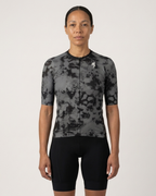 Person wearing a high-end
black and gray pattern cycling jersey on a white background
